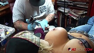 Shyla Stylez gets inked while playing with her tits